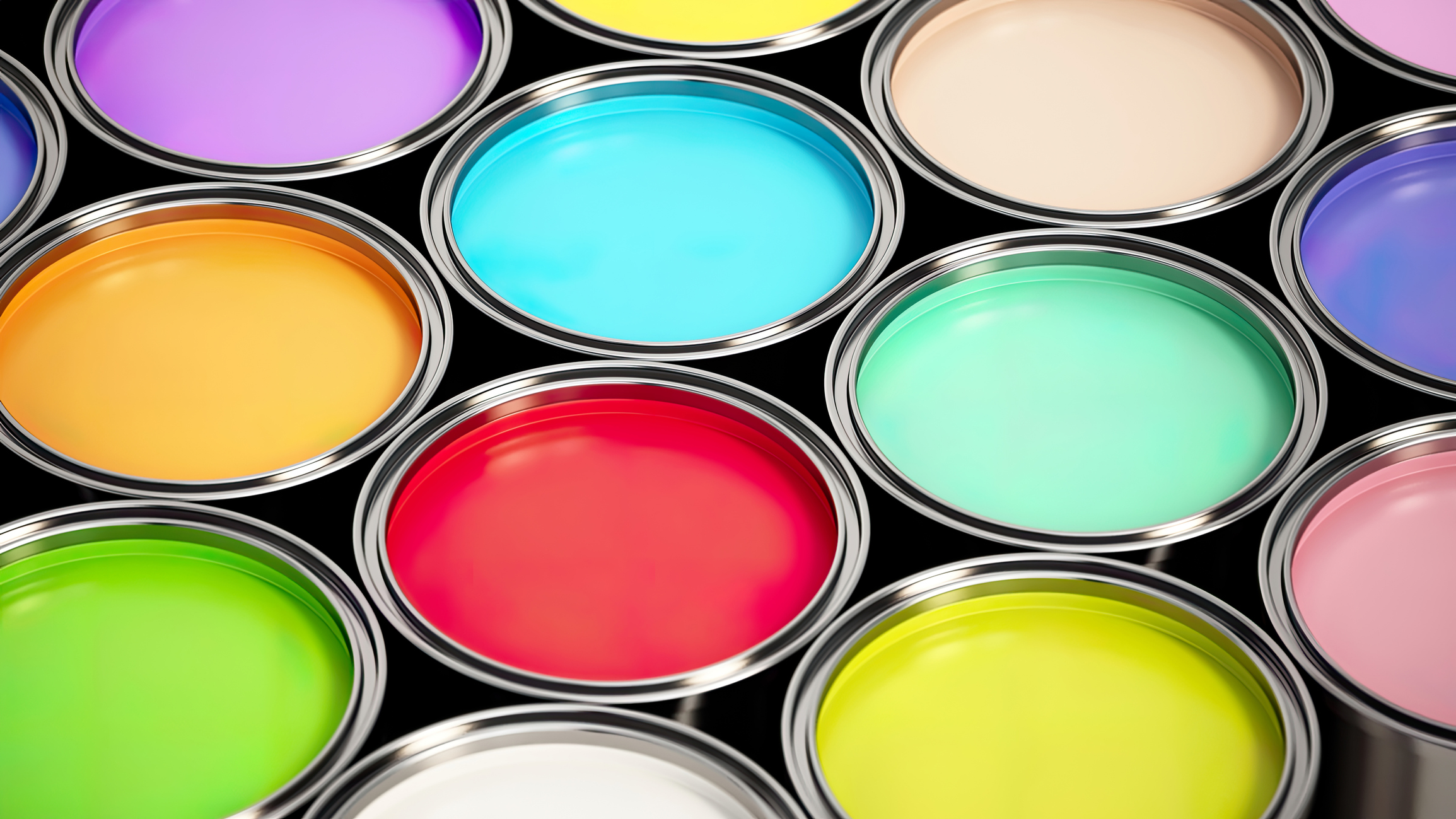 Vibrant paint cans are neatly arranged in rows, showcasing a wide variety of colors including purple, yellow, teal, and red. This bright display invites creativity and DIY projects.
